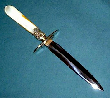 The Druggist and the Dagger pearl handled dagger. http://www.sharppointythings.com/gallery.html